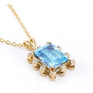 Necklace 18K Yellow GoldOver
Sterling Silver .07 CTW
Diamond and 5.05 CTW
Topaz